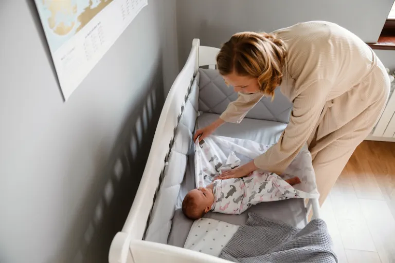 How to Swaddle a Baby Safely: Techniques & Tips